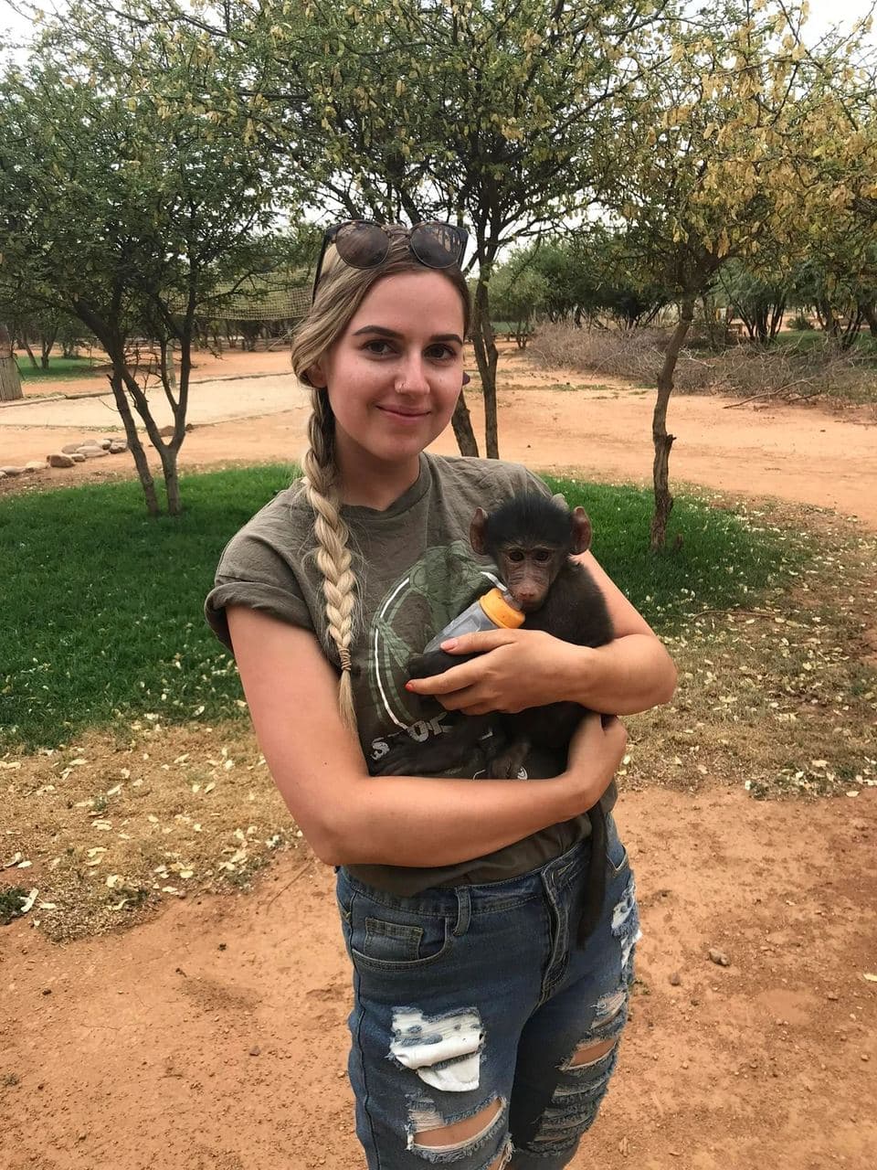 Sophie volunteering with rescued rhinos, baboons, cheetahs and the wider team at the N/a'an ku se Foundation reserve in Namibia, November 2018